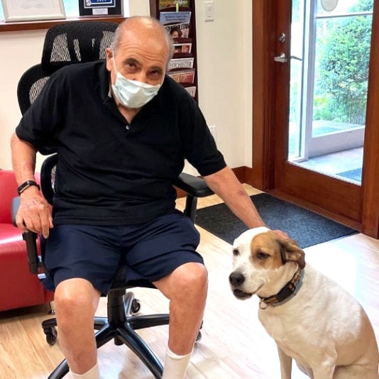 A patient smiling at the camera