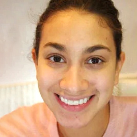 A patient smiling at the camera