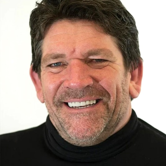 A patient smiling at the camera